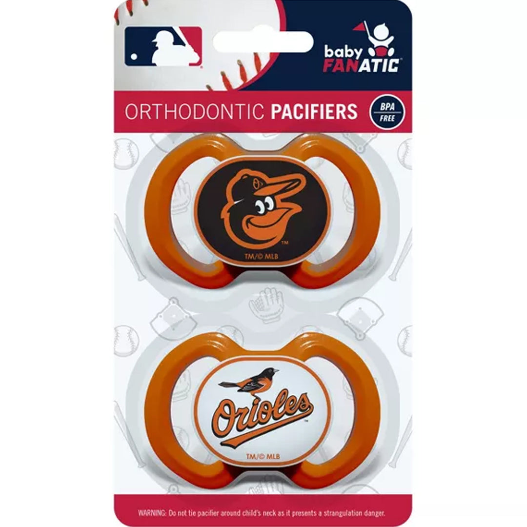 Two orange and white pacifiers with Orioles logo in packaging, featuring MLB and babyFANATIC branding.