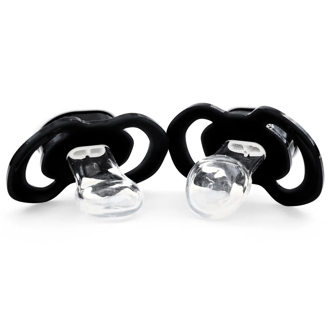 Two black pacifiers with clear silicone teats on a white background