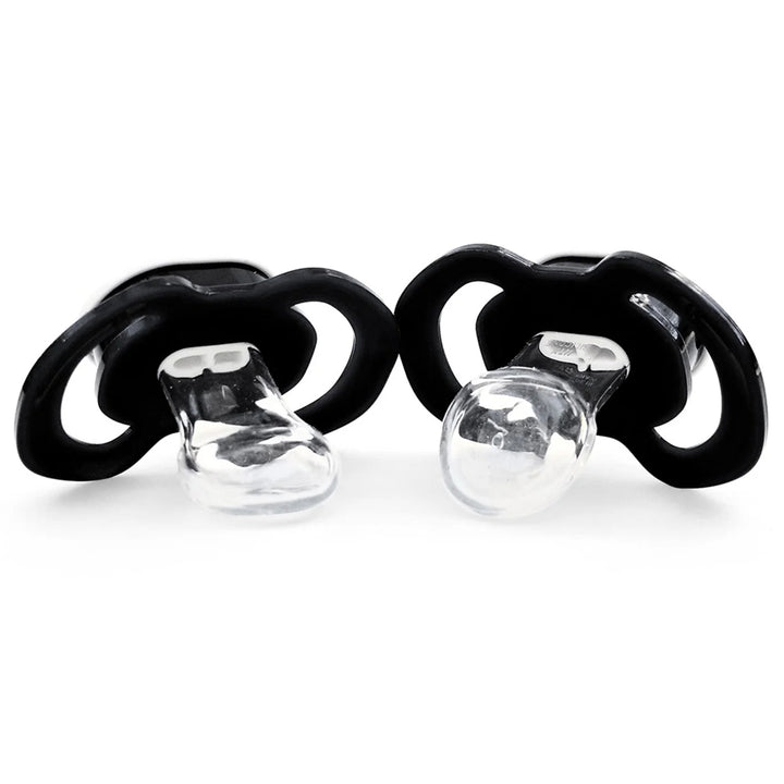 Two black pacifiers with clear silicone teats on a white background