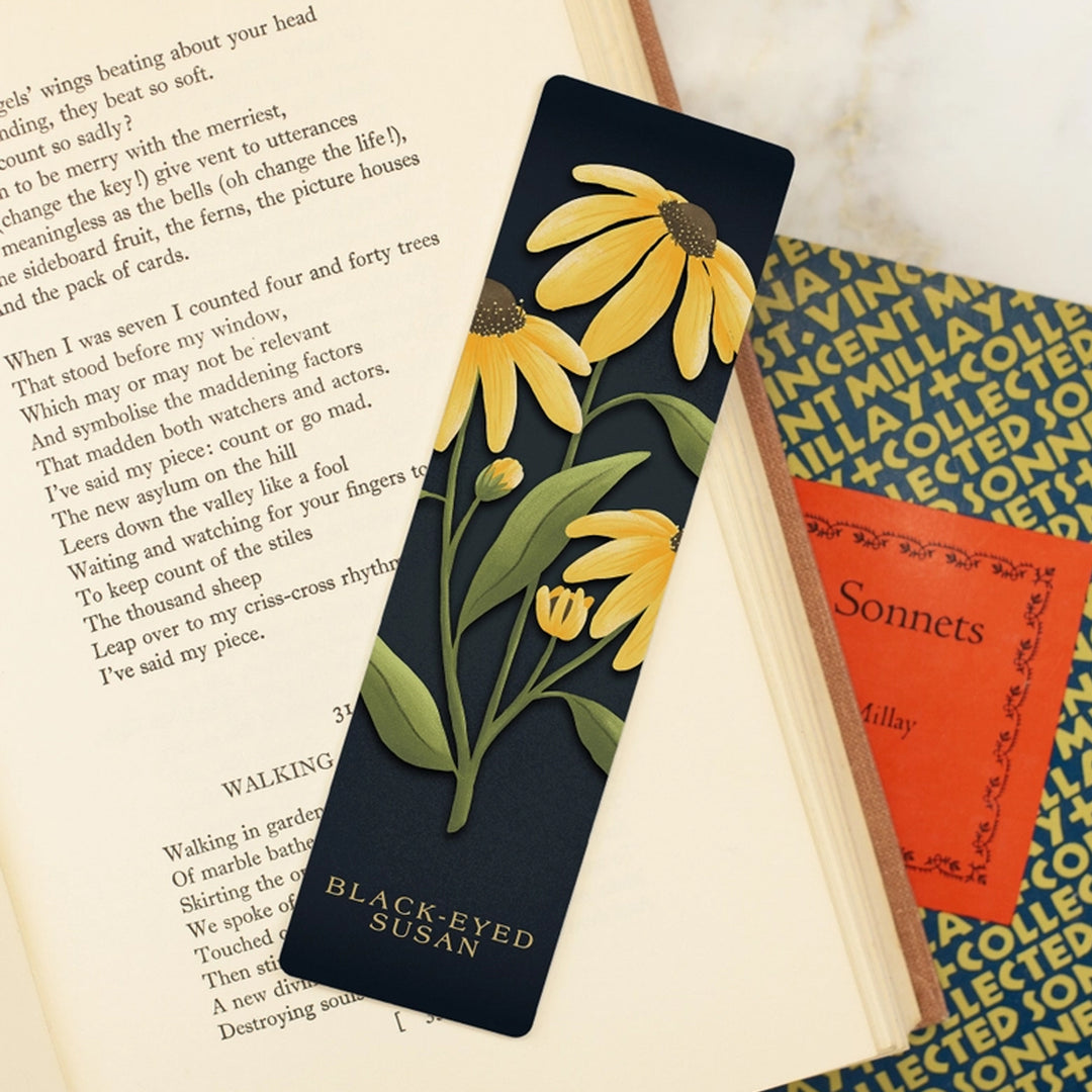Black-Eyed Susans Metal Bookmark scene with books.