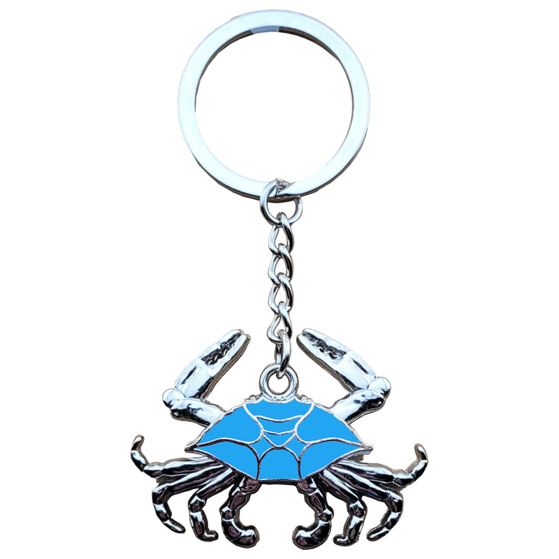 key ring with a blue shell crab and moveable chrome look legs