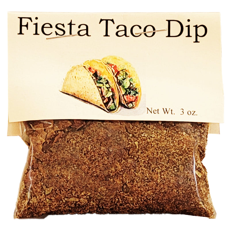 Packaged Fiesta Taco Dip mix with a taco illustration on a beige label.