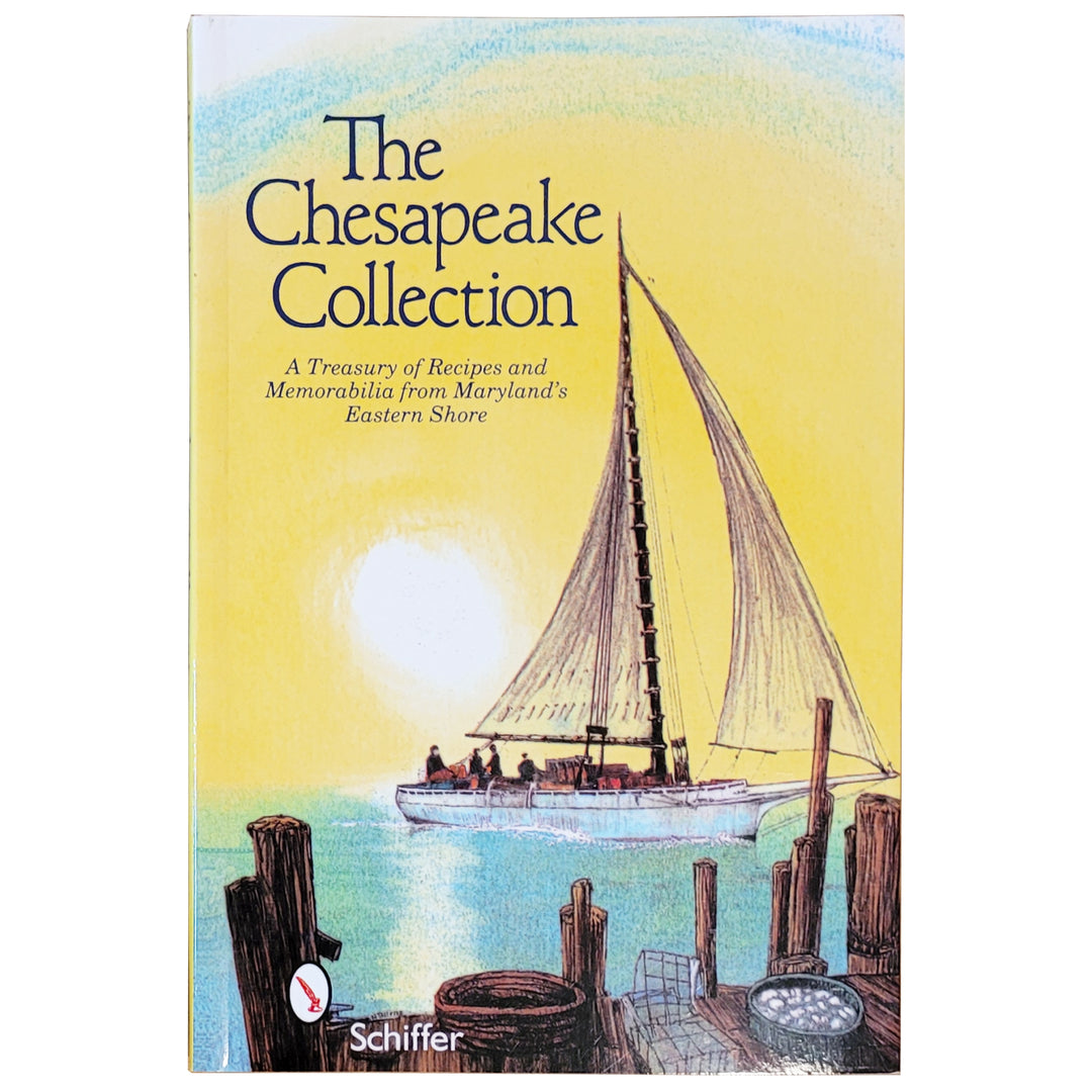 The Chesapeake Collection cookbook featuring a vintage illustration of a sailboat and a wooden dock on the cover against a yellow sky.