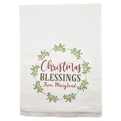 White towel with 'Christmas Blessings From Maryland' text and green leaf design on a white background