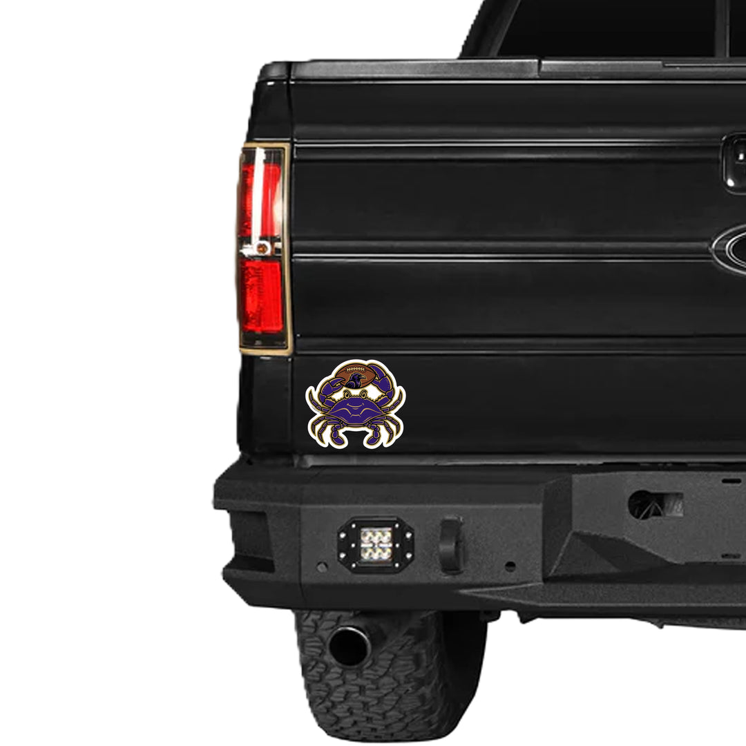 Purple Crab and Raven On Football Die Cut Sticker on vehicle