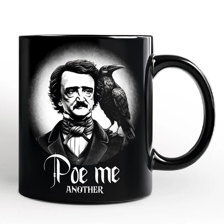 A black ceramic mug featuring a black-and-white graphic of Edgar Allan Poe with a raven on his shoulder and the text &
