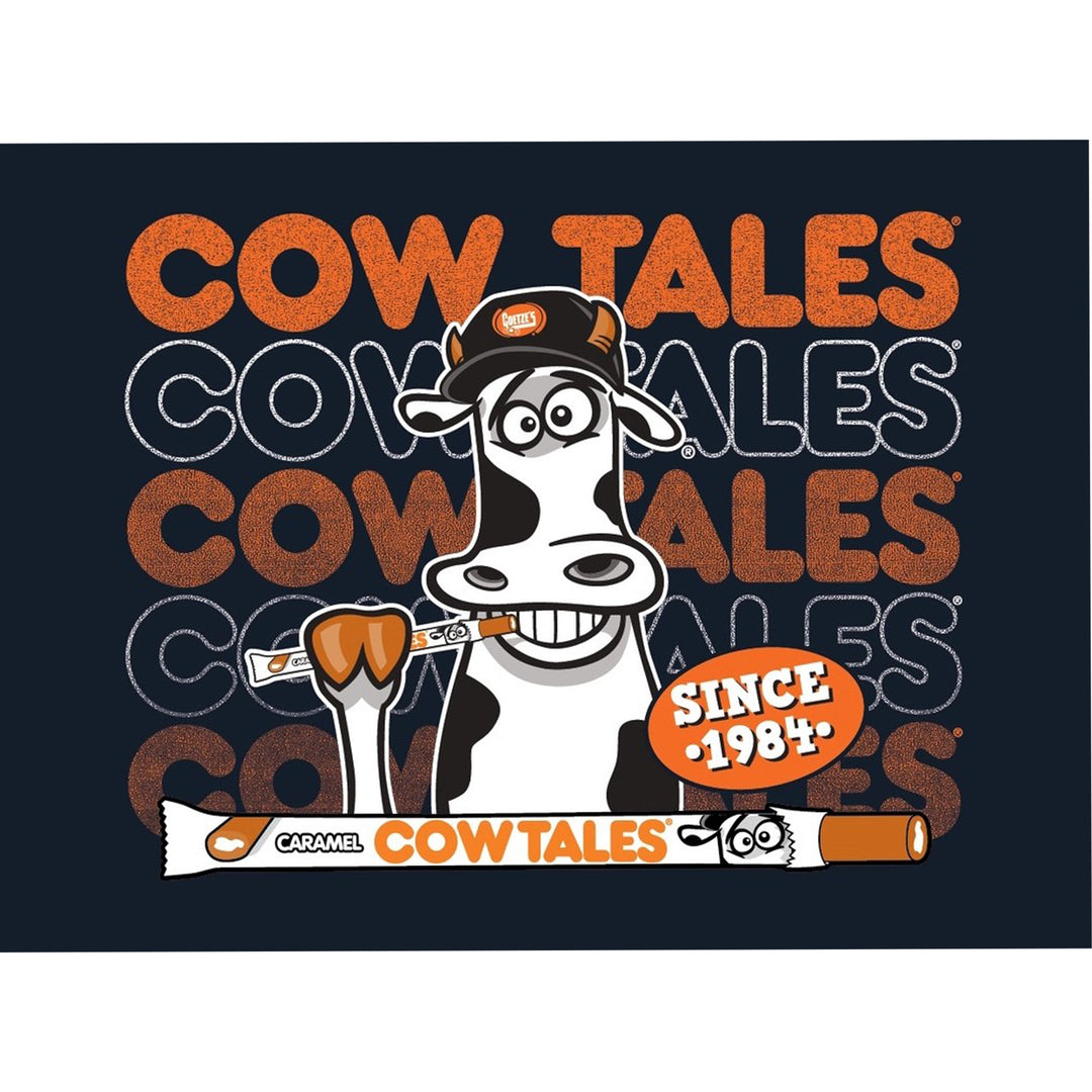 Cow Tales candy magnet with a cow illustration and text on a dark background