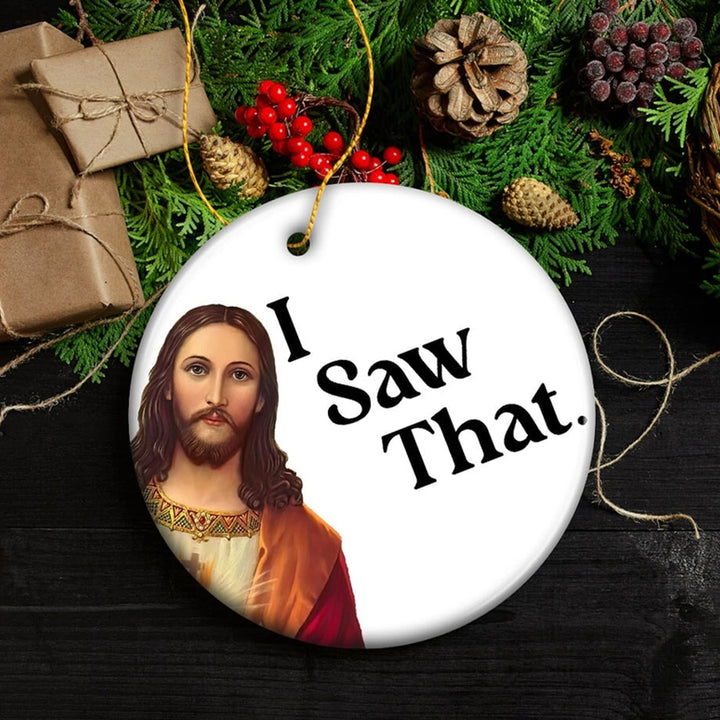 Round white Christmas ornament featuring a printed portrait of Jesus and the text &