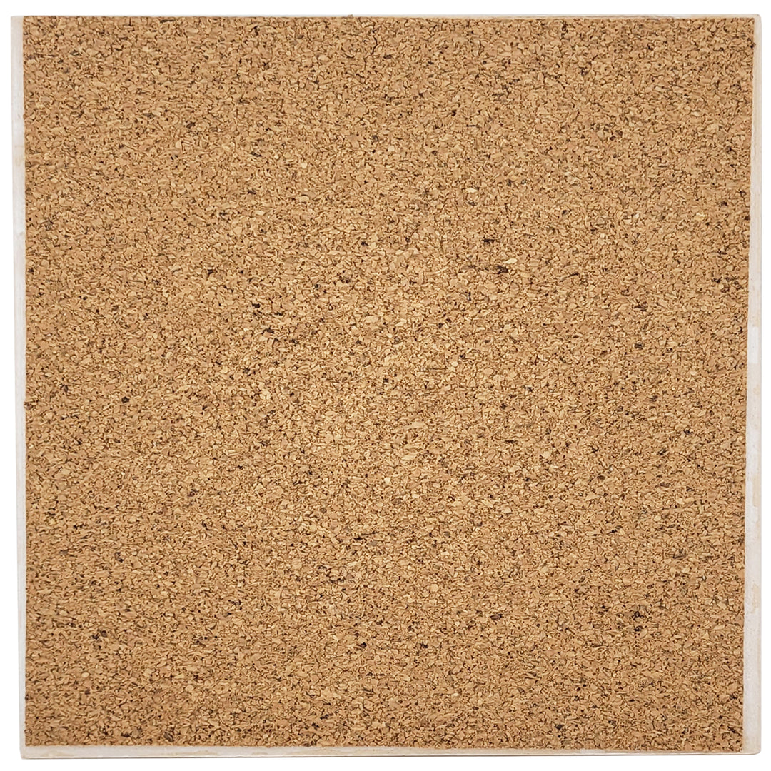 The cork backing of a  square decorative ceramic trivet featuring the Maryland state flag design on the reverse.
