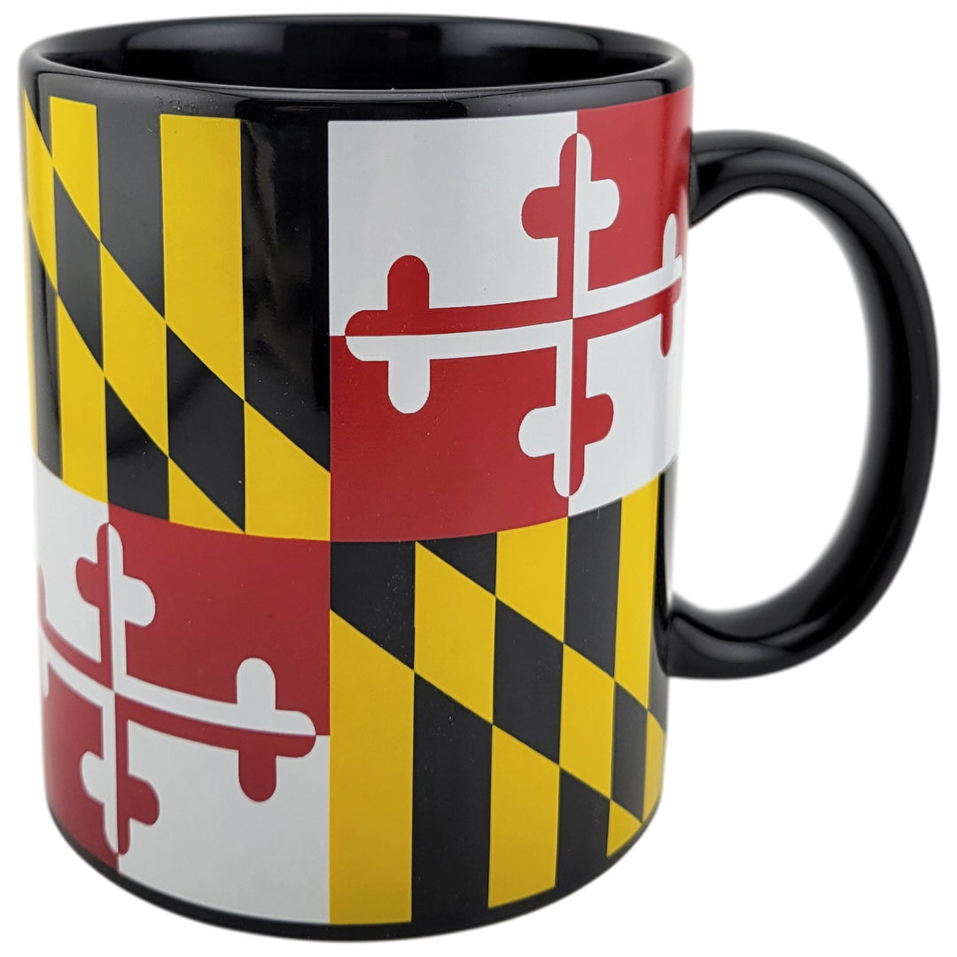 A glossy ceramic mug featuring the Maryland state flag design with black, yellow, red, and white quadrants, shown on a plain white background.