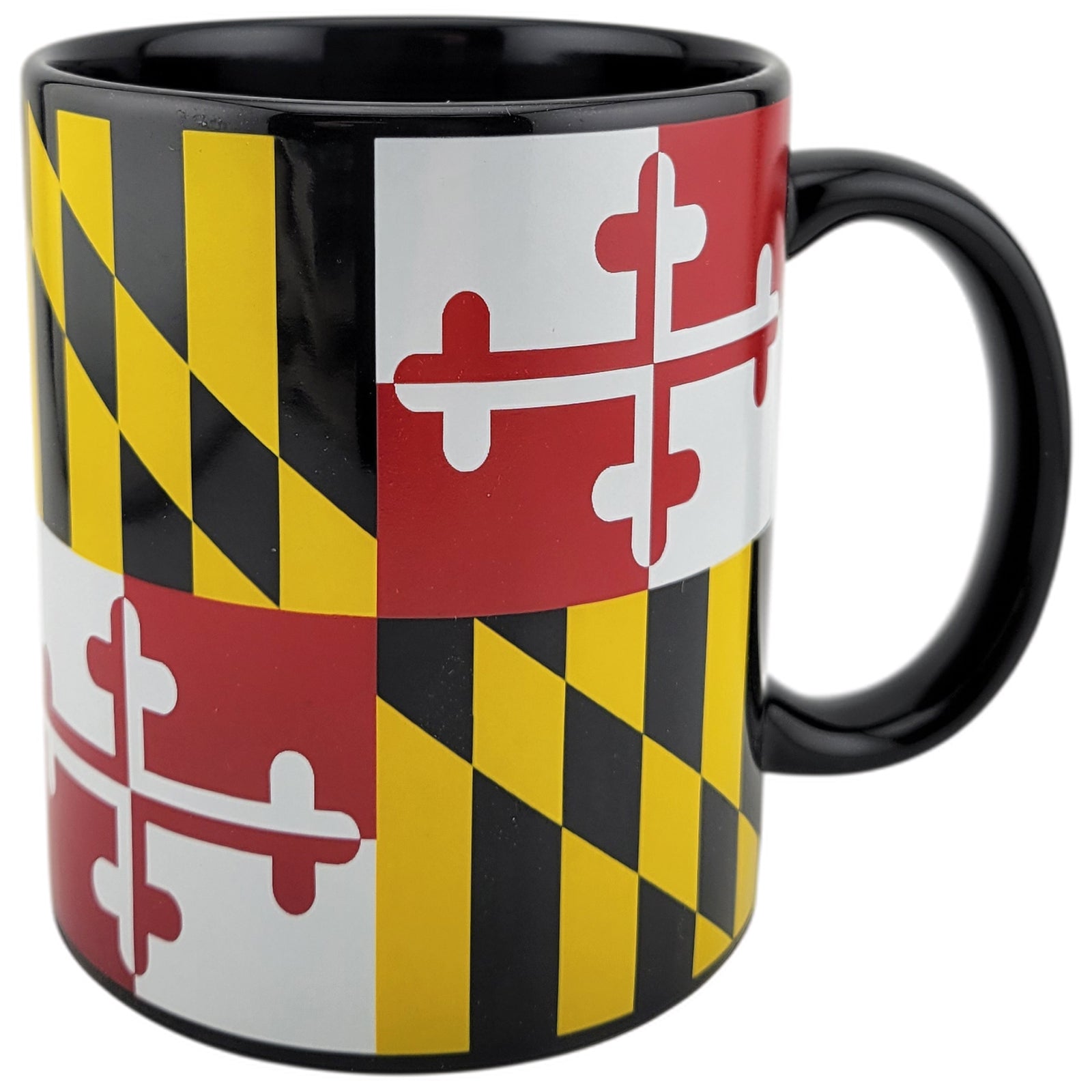 A glossy ceramic mug featuring the Maryland state flag design with black, yellow, red, and white quadrants, shown on a plain white background.