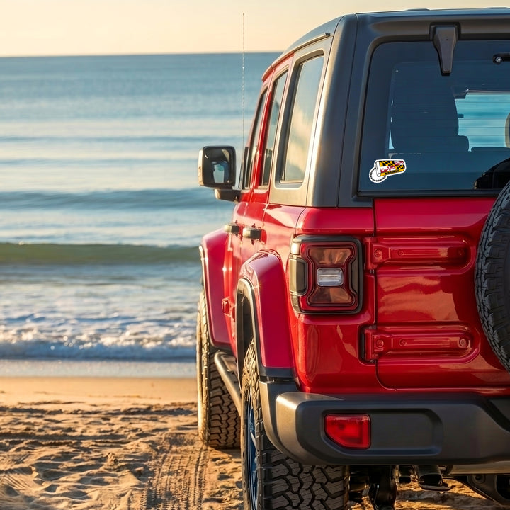 Maryland Flag Summer Souvenir Scope Vinyl Sticker on a red suv at the beach