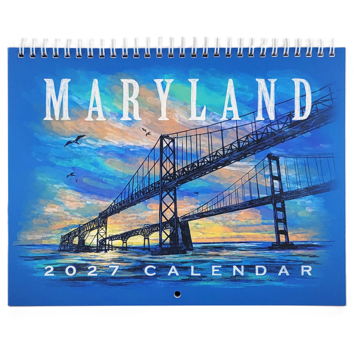 A spiral-bound 2027 Maryland calendar featuring a colorful painted bridge scene over water, with large white 'MARYLAND' text at the top and '2027 CALENDAR' at the bottom.
