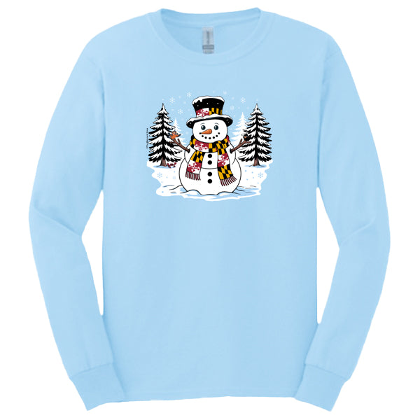 long sleeve t-shirt with front design of a snowman with Maryland Flag scarf and hat band with an oriole and raven on stick arms and a red crab under a pine tree with snow on the ground and trees