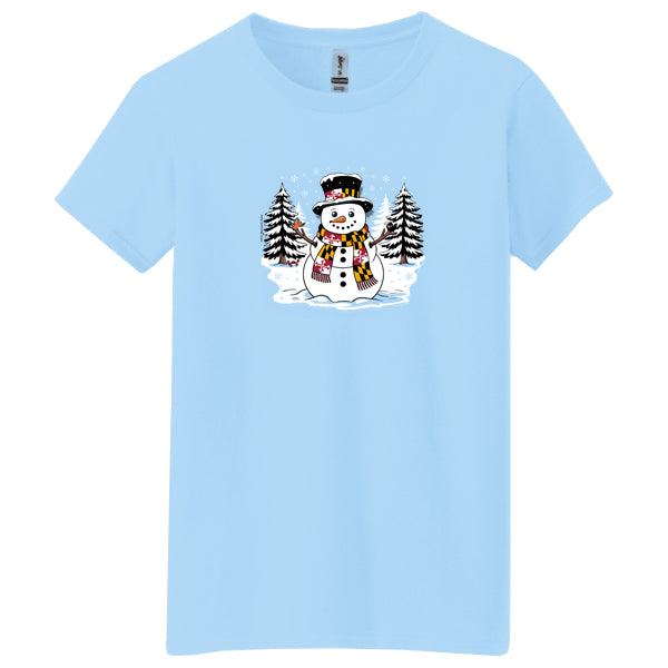 light blue t-shirt with maryland snowman design featuring a snowman with a Maryland flag scarf and hat band with a oriole and raven on each arm, a red crab under a pine tree and a snow covered ground.
