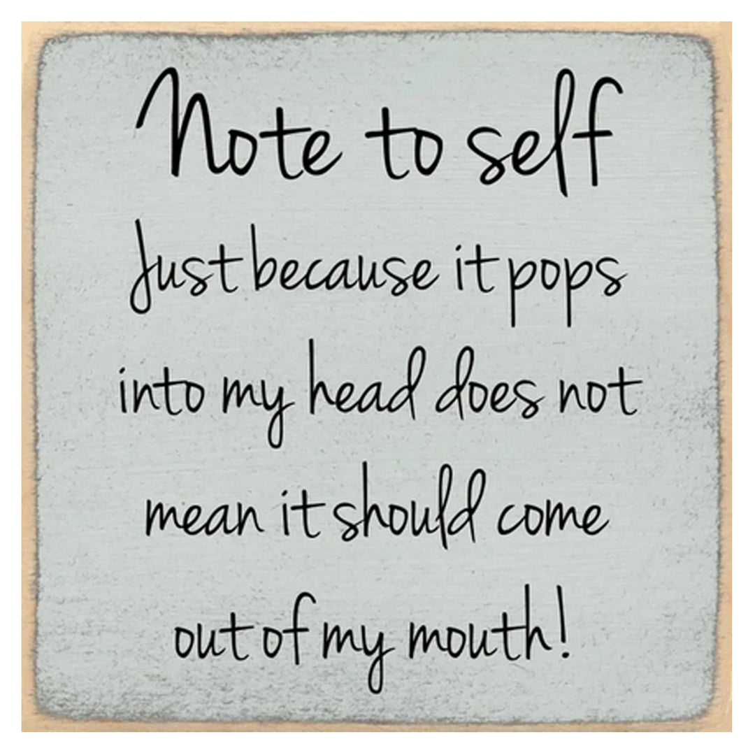 Wooden sign with text &