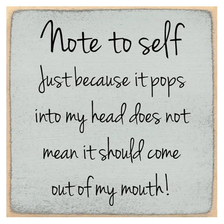 Wooden sign with text &