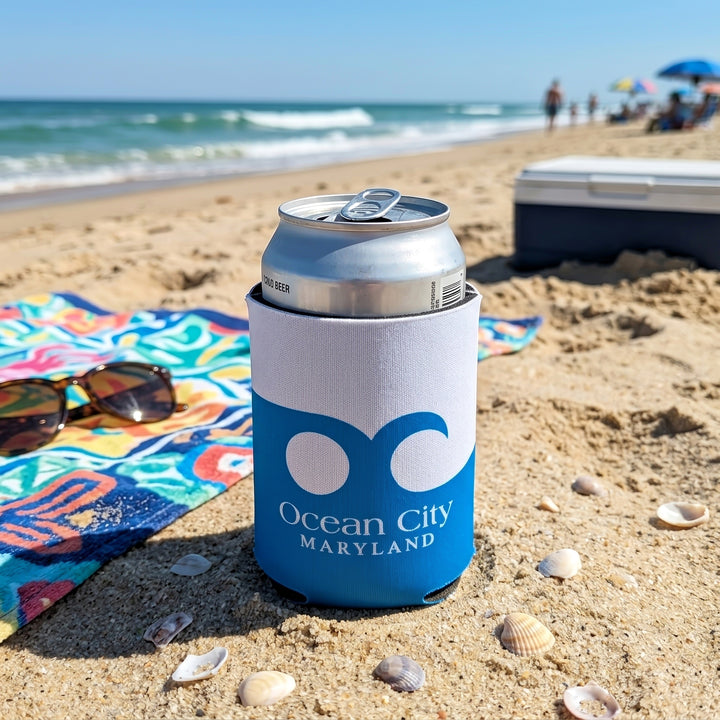 Ocean City Maryland Blue Wave Can Coolie with a can inside on the beach.