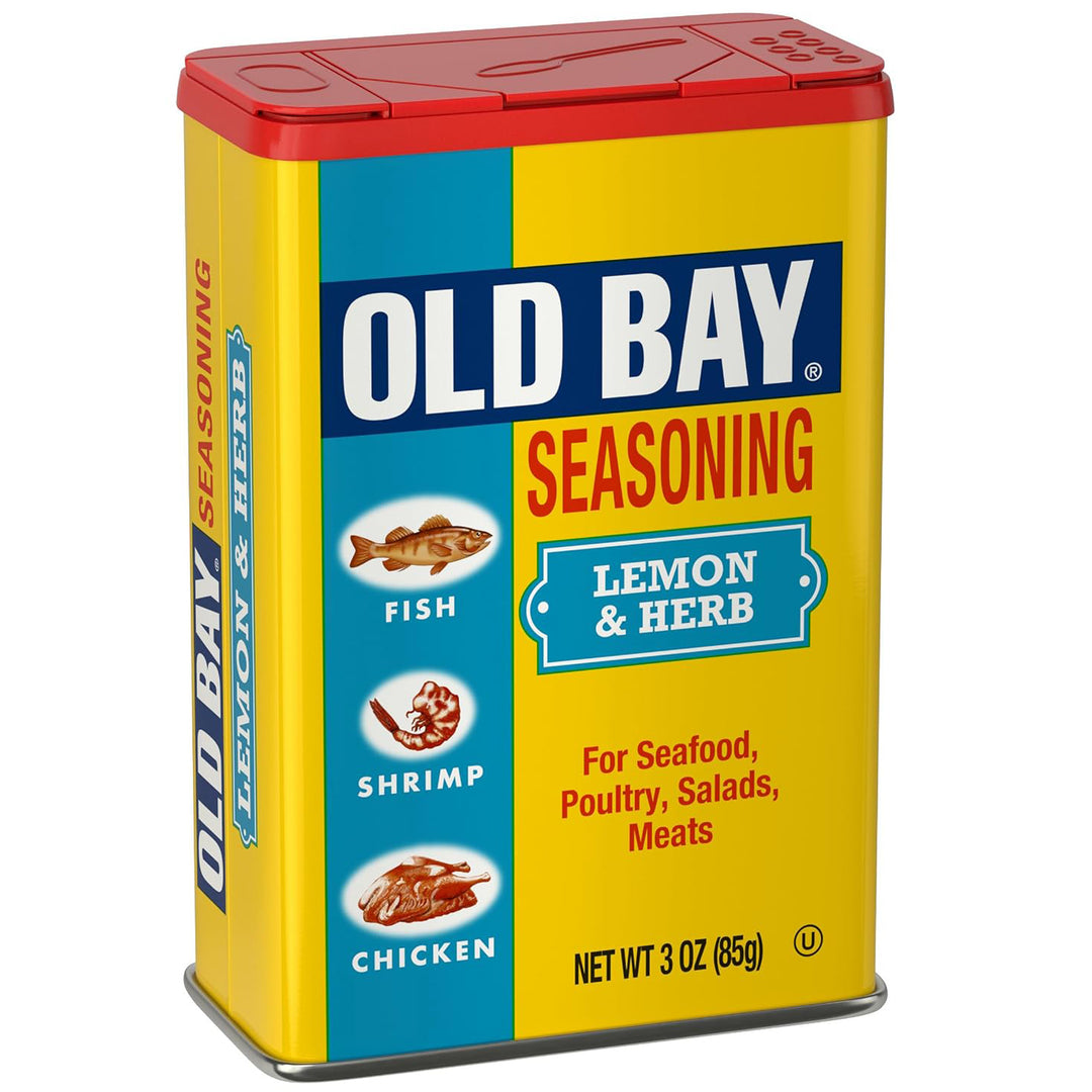 A 3 oz tin of Old Bay Seasoning Lemon &amp; Herb, featuring a bright yellow and blue label with a red lid, shown on a plain white background.