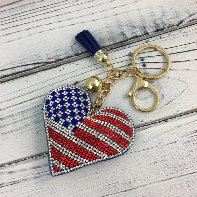 Heart-shaped keychain with American flag rhinestone design