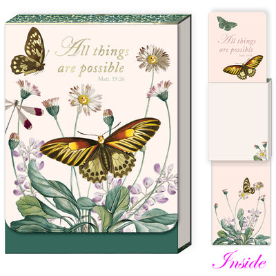 Decorative notepad with butterfly and floral design, featuring the quote 'All things are possible'.