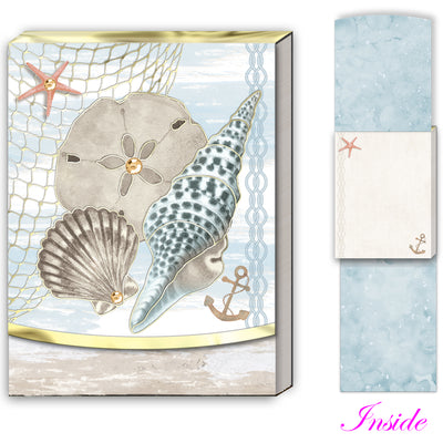 Seashell-themed notepad with starfish and anchor on a light blue background